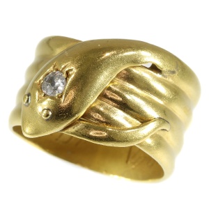 Antique gold English coiled snake ring with old brilliant cut diamond (ca. 1893)
